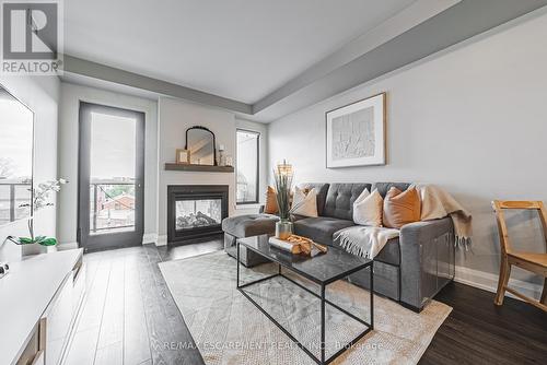 402 - 181 James Street N, Hamilton, ON - Indoor Photo Showing Living Room With Fireplace