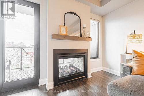 402 - 181 James Street N, Hamilton, ON - Indoor Photo Showing Living Room With Fireplace