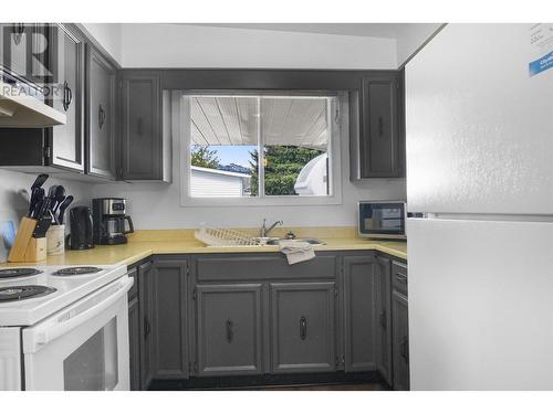 36 Bartholomew Street, Kitimat, BC - Indoor Photo Showing Kitchen With Double Sink