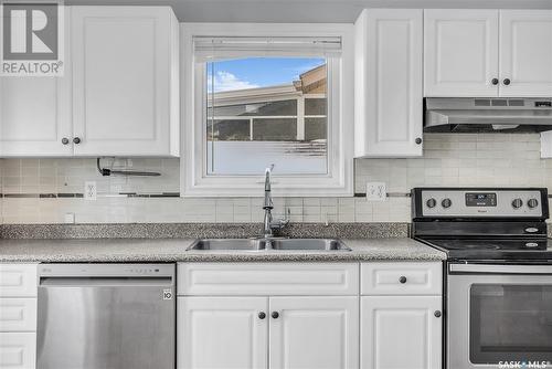 235 Beerling Crescent, Saskatoon, SK - Indoor Photo Showing Kitchen With Double Sink