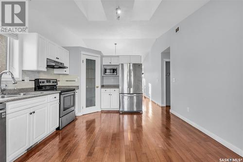 235 Beerling Crescent, Saskatoon, SK - Indoor Photo Showing Kitchen With Double Sink