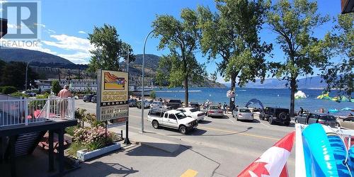 Summer time view towards the lake - 1028 Lakeshore Drive Unit# 221, Penticton, BC - Outdoor With Body Of Water With View