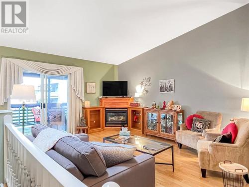 10500 Orchard Crescent Unit# 4, Summerland, BC - Indoor Photo Showing Living Room With Fireplace