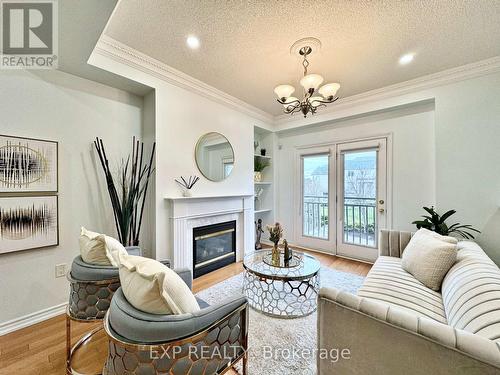 Th7 - 9133 Bayview Avenue, Richmond Hill, ON - Indoor Photo Showing Living Room With Fireplace