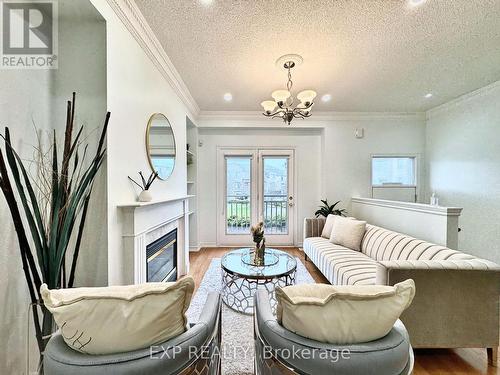 Th7 - 9133 Bayview Avenue, Richmond Hill, ON - Indoor Photo Showing Living Room With Fireplace