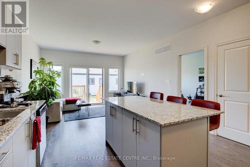 84 Cheryl Avenue, North Perth, ON - Indoor Photo Showing Kitchen With Double Sink