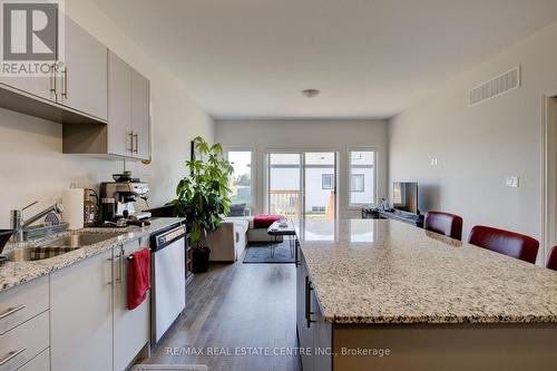 84 Cheryl Avenue, North Perth, ON - Indoor Photo Showing Kitchen With Double Sink With Upgraded Kitchen