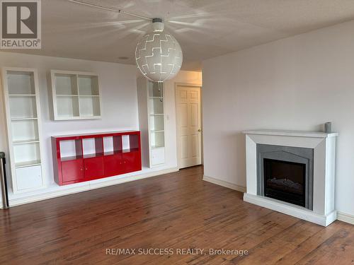 901 - 67 Caroline Street S, Hamilton, ON - Indoor Photo Showing Living Room With Fireplace