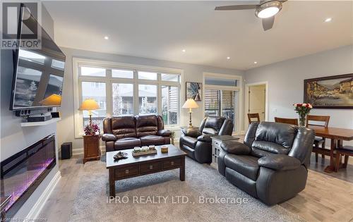 18 - 9245 Shoveller Avenue, Niagara Falls, ON - Indoor Photo Showing Living Room With Fireplace