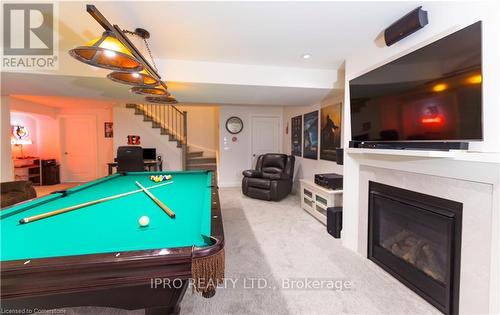 18 - 9245 Shoveller Avenue, Niagara Falls, ON - Indoor Photo Showing Other Room With Fireplace