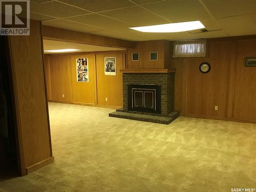 7627 Discovery Road, Regina, SK - Indoor Photo Showing Basement With Fireplace