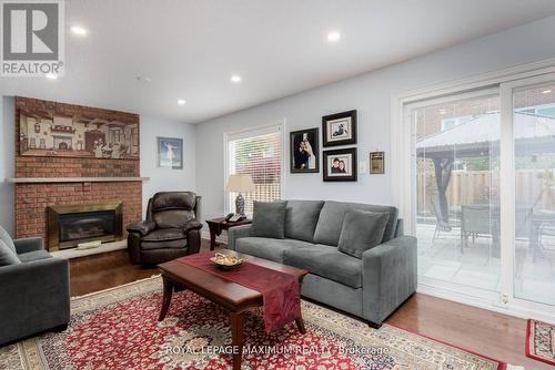 44 Flagstick Court, Toronto, ON - Indoor Photo Showing Living Room With Fireplace