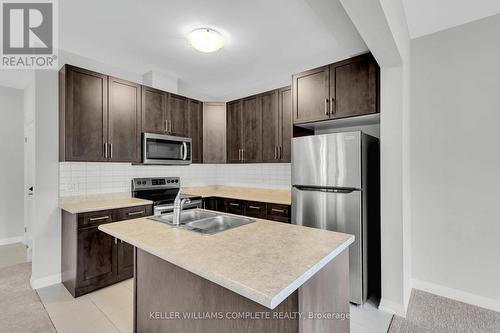 4282 Shuttleworth Drive, Niagara Falls, ON - Indoor Photo Showing Kitchen With Stainless Steel Kitchen With Double Sink With Upgraded Kitchen