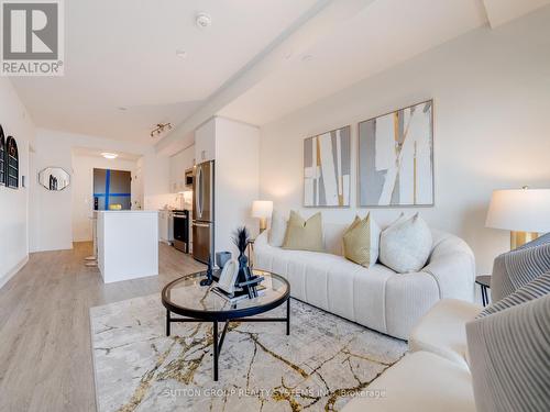 413 - 345 Wheat Boom Drive, Oakville, ON - Indoor Photo Showing Living Room