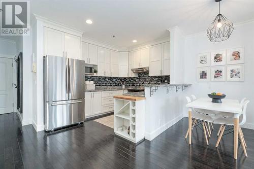 304, 916 19 Avenue Sw, Calgary, AB - Indoor Photo Showing Kitchen With Stainless Steel Kitchen With Upgraded Kitchen