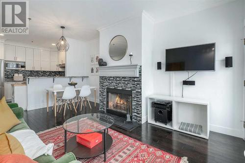 304, 916 19 Avenue Sw, Calgary, AB - Indoor Photo Showing Living Room With Fireplace