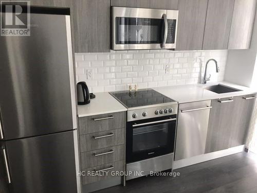 2301 - 28 Wellesley Street E, Toronto, ON - Indoor Photo Showing Kitchen With Upgraded Kitchen