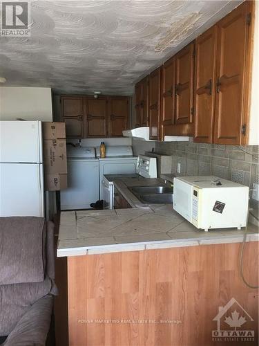 350 St Phillipe Street, Alfred And Plantagenet, ON - Indoor Photo Showing Kitchen With Double Sink