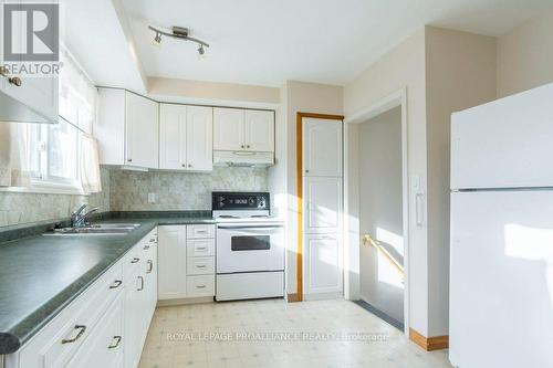 20 King George Square, Belleville, ON - Indoor Photo Showing Kitchen With Double Sink