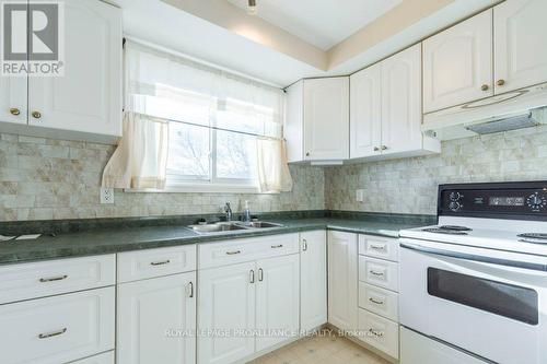 20 King George Square, Belleville, ON - Indoor Photo Showing Kitchen With Double Sink