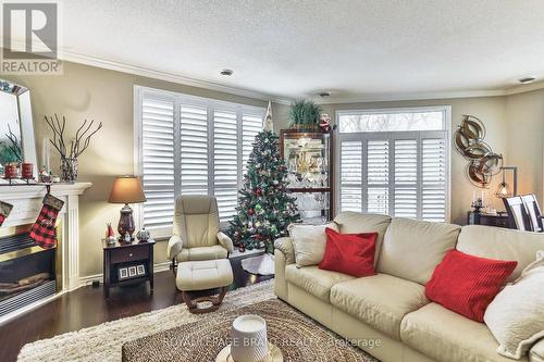 #104 - 255 Keats Way, Waterloo, ON - Indoor Photo Showing Living Room With Fireplace