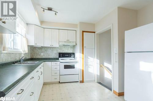 20 King George Square, Belleville, ON - Indoor Photo Showing Kitchen With Double Sink