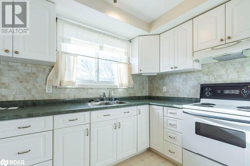 20 King George Square, Belleville, ON - Indoor Photo Showing Kitchen With Double Sink