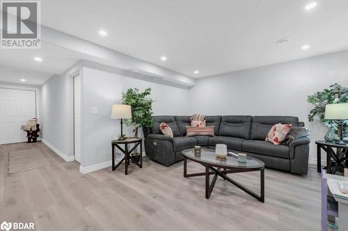 Living room featuring light hardwood / wood-style flooring - 35 Albion Street Unit# 37, Belleville, ON - Indoor Photo Showing Living Room