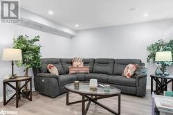 Living room featuring light hardwood / wood-style floors - 