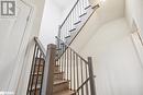 Stairs with hardwood / wood-style flooring - 1569 Rose Way Unit# 104, Milton, ON  - Indoor Photo Showing Other Room 