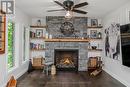 4422 Highway 15, Kingston, ON  - Indoor Photo Showing Living Room With Fireplace 