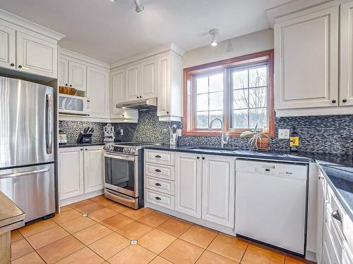 Cuisine - 13398 Rue Gladu, Mirabel, QC - Indoor Photo Showing Kitchen With Upgraded Kitchen