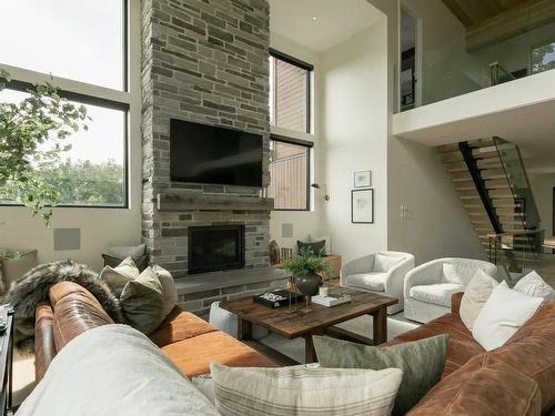 Living room - 30 Mtée De Kicking Horse, Morin-Heights, QC - Indoor Photo Showing Living Room With Fireplace