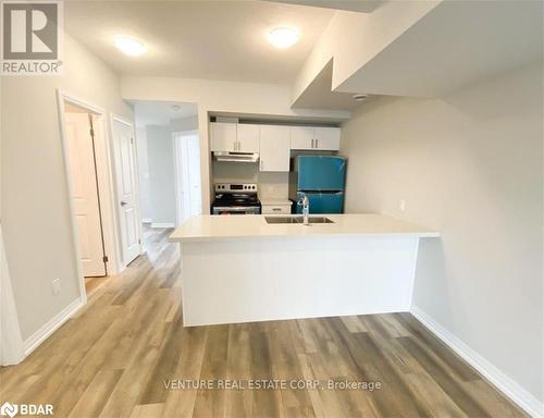 50 - 6705 Cropp Street, Niagara Falls, ON - Indoor Photo Showing Kitchen