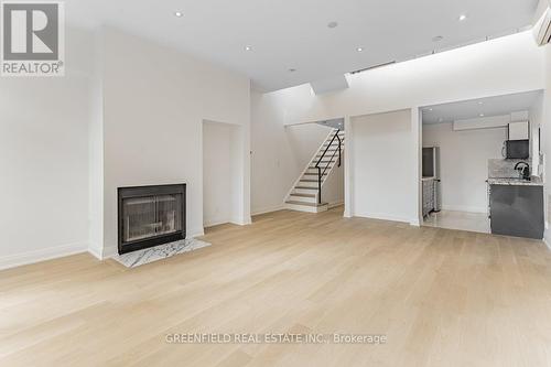 3 - 185 Carlton Street, Toronto, ON - Indoor Photo Showing Other Room With Fireplace