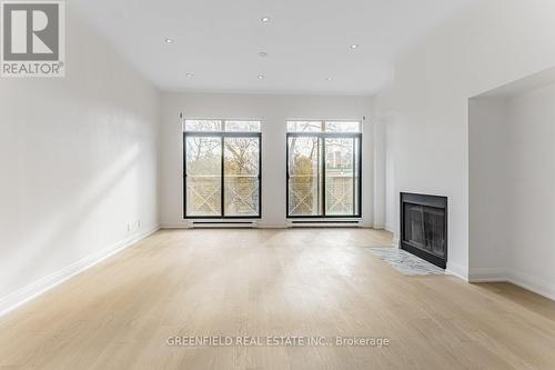 3 - 185 Carlton Street, Toronto, ON - Indoor With Fireplace