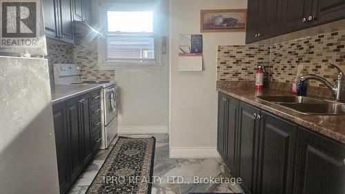 43 Corby Crescent, Brampton, ON - Indoor Photo Showing Kitchen With Double Sink