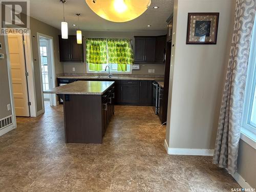 4473 James Hill Road, Regina, SK - Indoor Photo Showing Kitchen With Double Sink