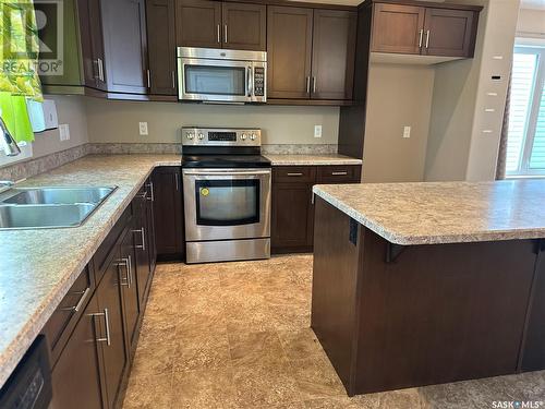 4473 James Hill Road, Regina, SK - Indoor Photo Showing Kitchen With Double Sink