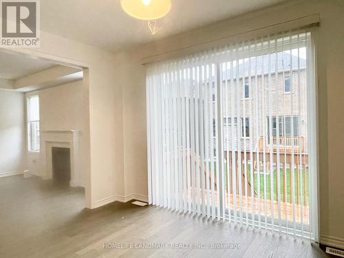 74 Suzuki Street, Barrie, ON - Indoor Photo Showing Other Room With Fireplace