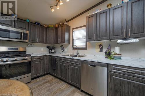 112 Meadowview Lane, Listowel, ON - Indoor Photo Showing Kitchen With Double Sink