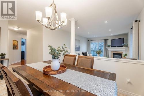 145 Valiant Circle, Hamilton, ON - Indoor Photo Showing Dining Room With Fireplace