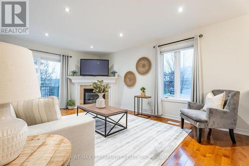 145 Valiant Circle, Hamilton, ON - Indoor Photo Showing Living Room With Fireplace