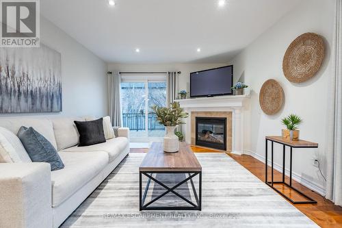 145 Valiant Circle, Hamilton, ON - Indoor Photo Showing Living Room With Fireplace