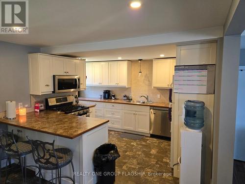 6285 Cadham Street, Niagara Falls, ON - Indoor Photo Showing Kitchen With Double Sink