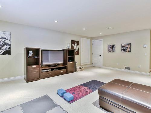 Family room - 90 Rue Du Midi, Morin-Heights, QC - Indoor Photo Showing Basement