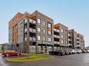 FaÃ§ade - 311-50 Ch. De La Carrière, Carignan, QC  - Outdoor With Facade 