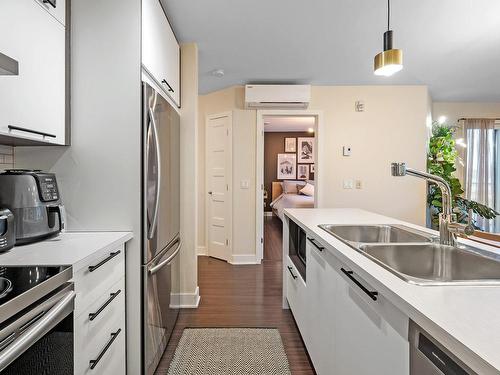 Cuisine - 311-50 Ch. De La Carrière, Carignan, QC - Indoor Photo Showing Kitchen With Double Sink