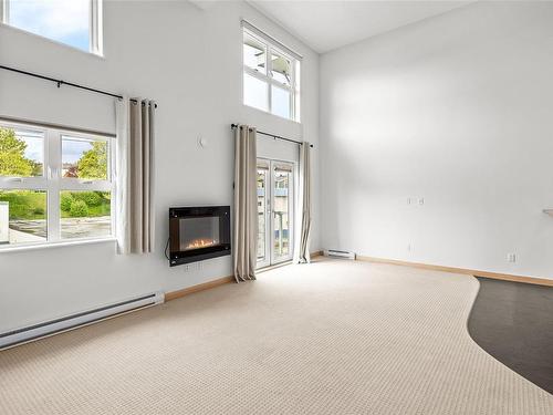 402-787 Tyee Rd, Victoria, BC - Indoor With Fireplace