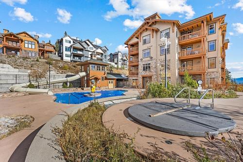 305/305A-255 Feathertop Way, Big White, BC - Outdoor With In Ground Pool